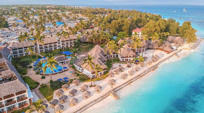 Aerial view of a tropical resort with beach and ocean called Tucaro in Zanzibar