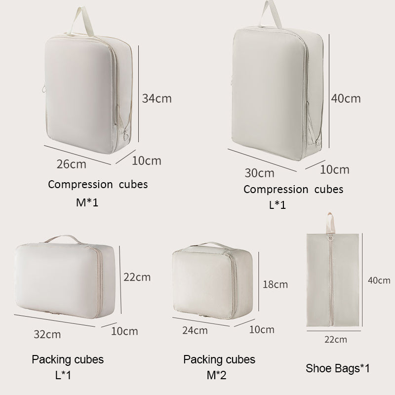 Set of compression cubes and packing cubes with dimensions labeled on a white background